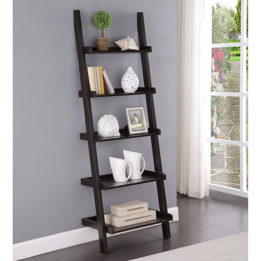 Dark wood ladder shelf with decorative items