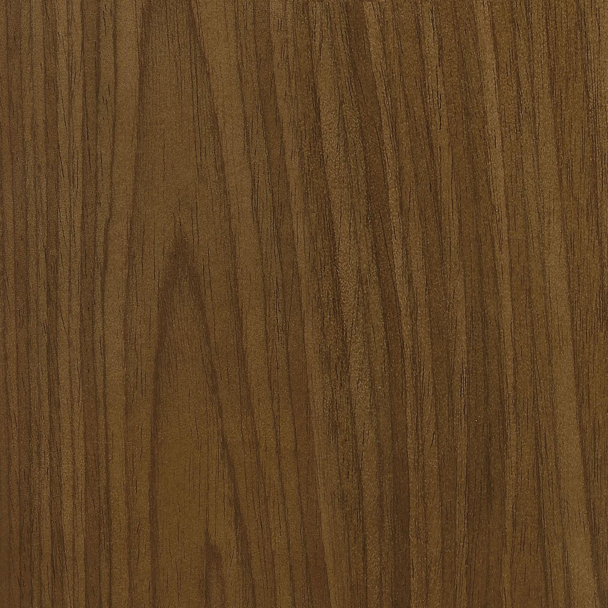 Closeup of natural dark walnut wood veneer with prominent grain for furniture applications