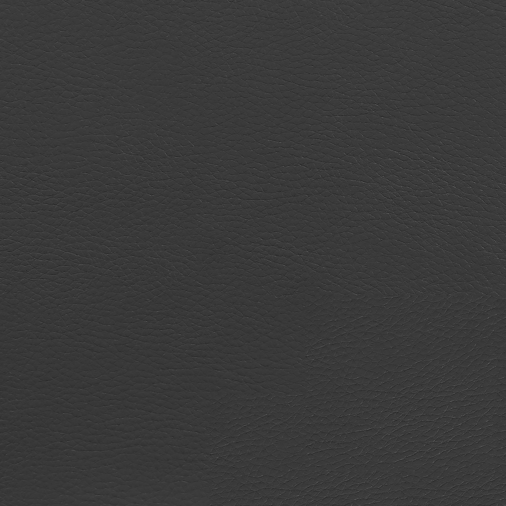 Closeup texture of charcoal grey vegan leather material ideal for upholstery
