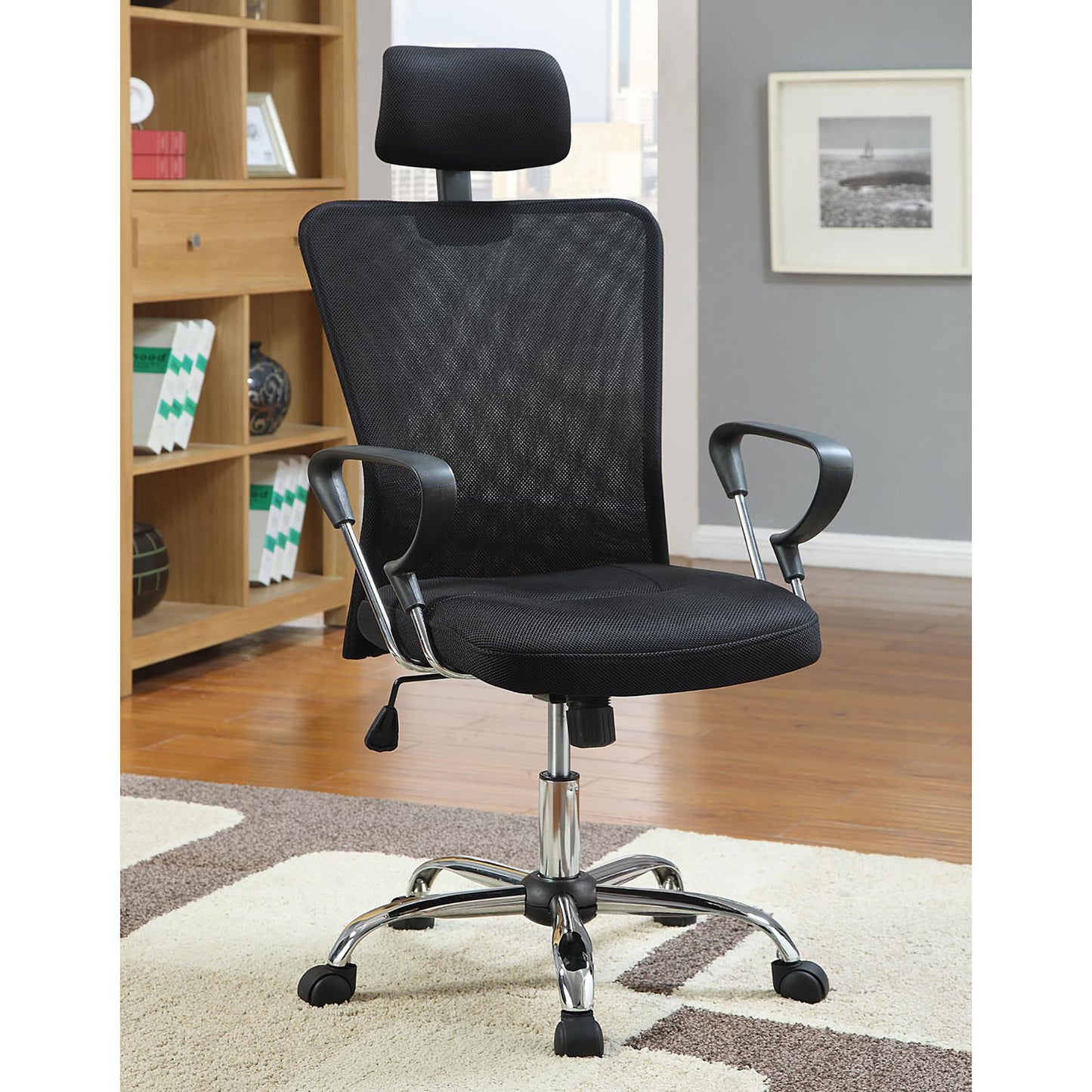 Ergonomic black mesh office chair with adjustable lumbar support and headrest