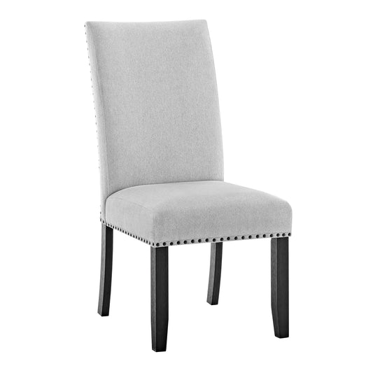Light grey upholstered dining chair with dark wood legs and studded trim