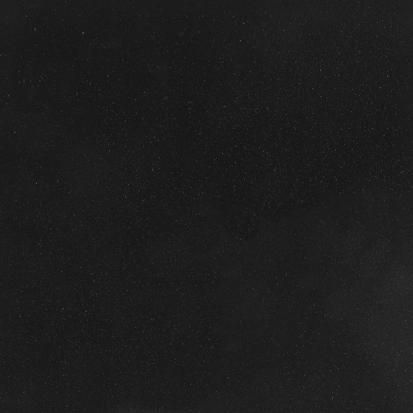 Matte black textured wallpaper with subtle metallic flecks