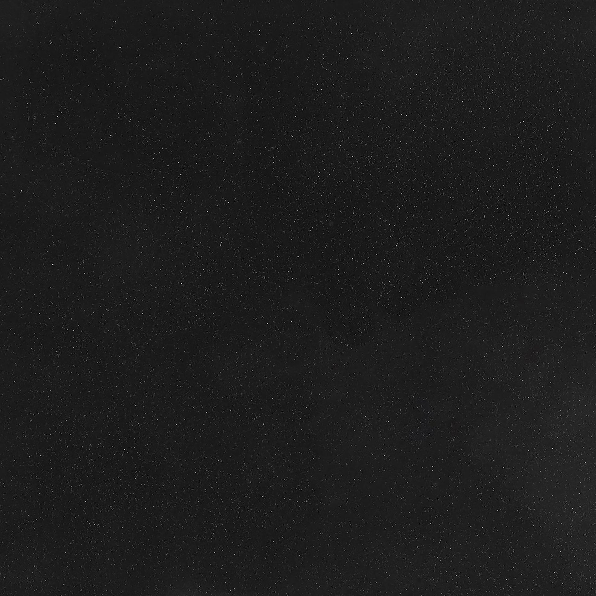 Matte black textured wallpaper with subtle metallic flecks