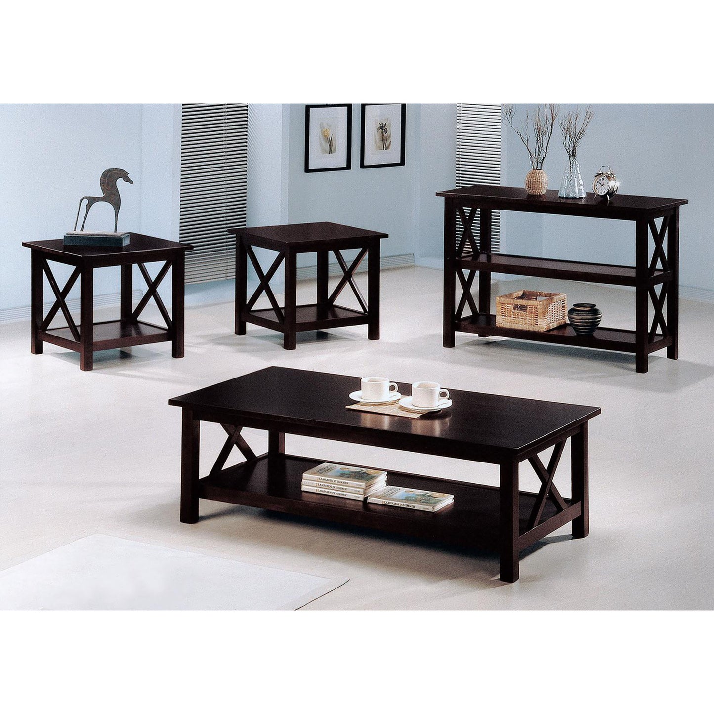 Dark wood coffee table with Xframe design and lower shelf holding books