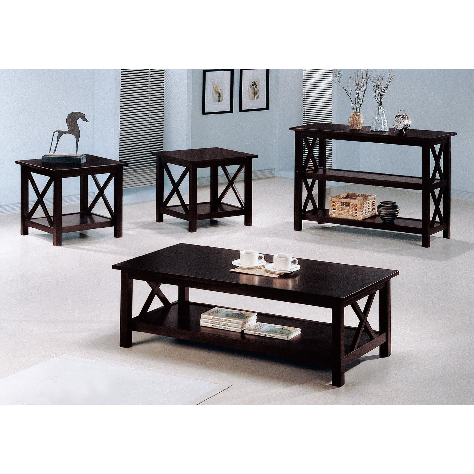 Dark wood coffee table with Xframe design and lower shelf holding books