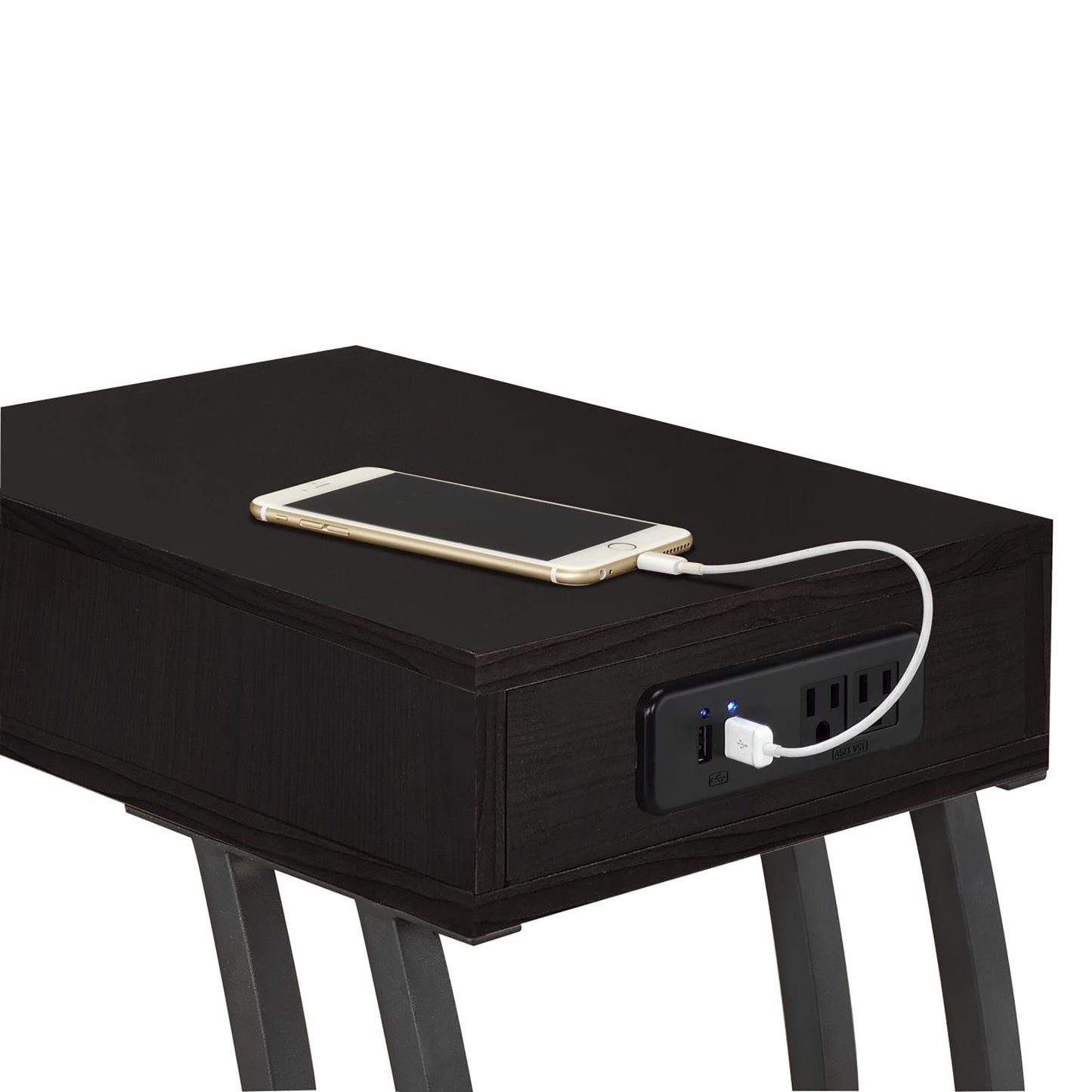 Dark wood end table with builtin USB charging ports and outlets holding a smartphone