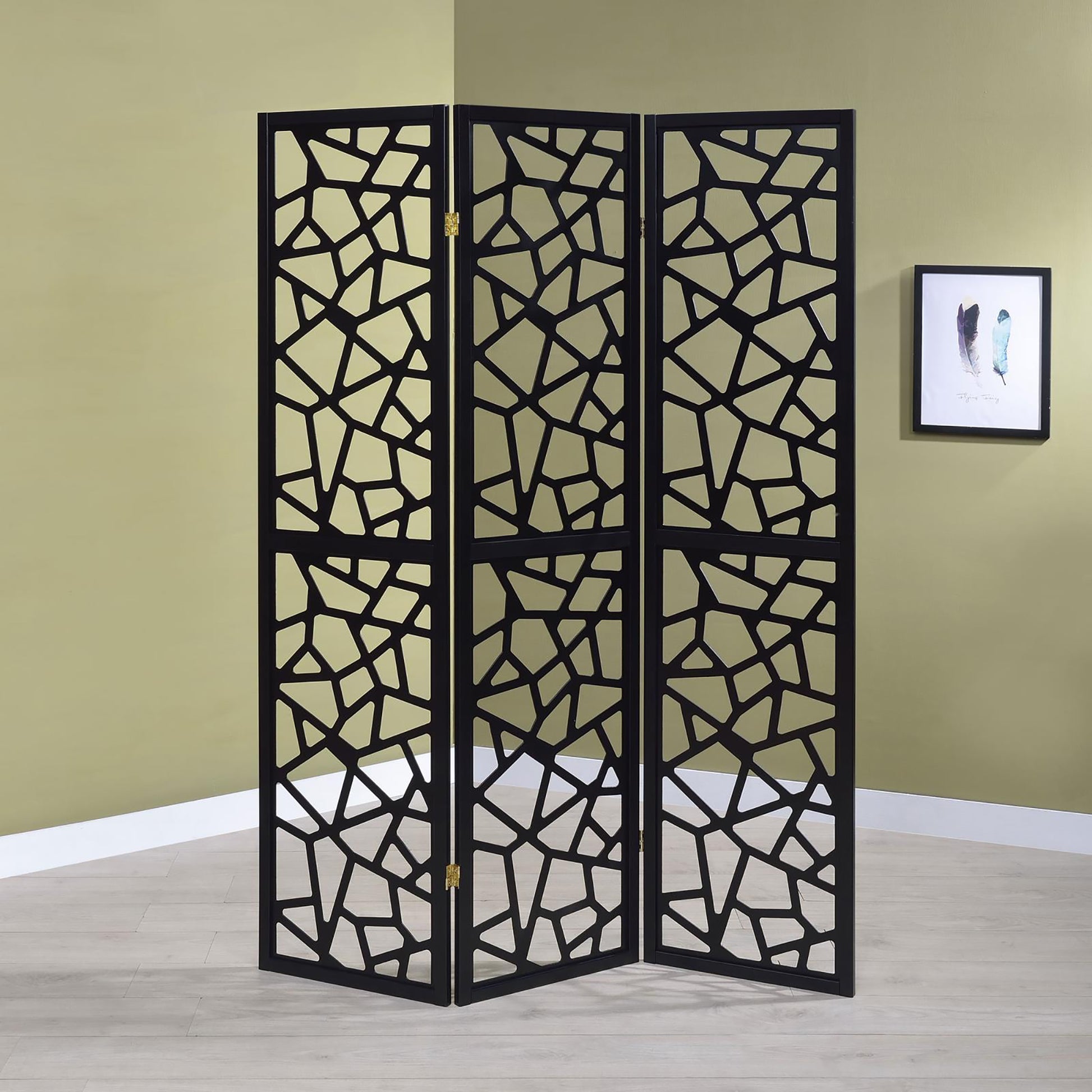Black panel room divider with abstract geometric cutouts perfect for creating privacy