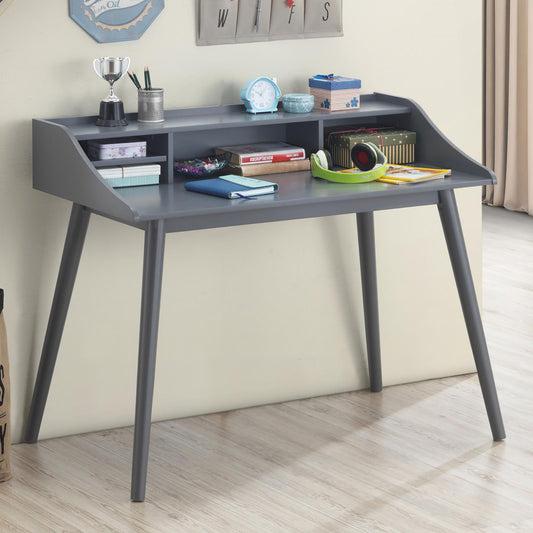 Gray wooden writing desk with four tapered legs and tiered shelf