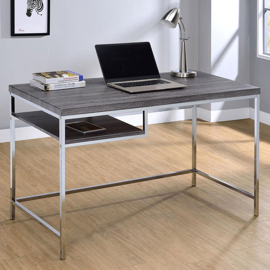Modern grey wood writing desk with chrome legs and open shelving for home office