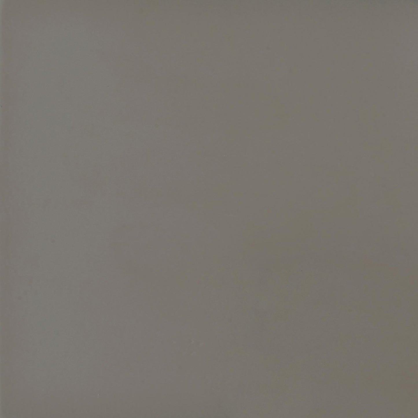 Matte taupe ceramic tile with a subtle speckled texture