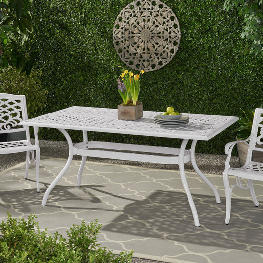 White metal rectangular dining table with intricate lattice design perfect for patio dining