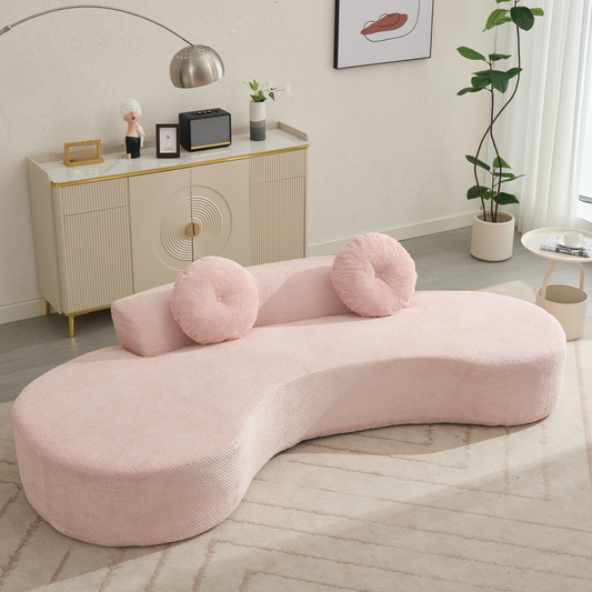 Curved pink boucle fabric sofa with round accent pillows modern living room furniture