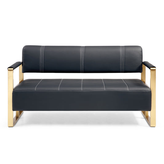 Sleek dark gray leather loveseat with white stitching and gold metal legs