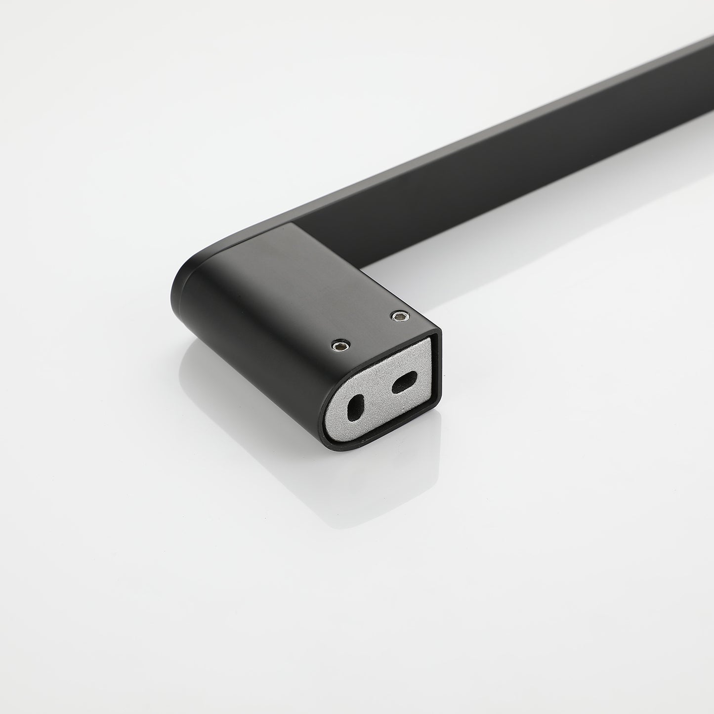 Black matte finish cabinet handle with a modern minimalist design