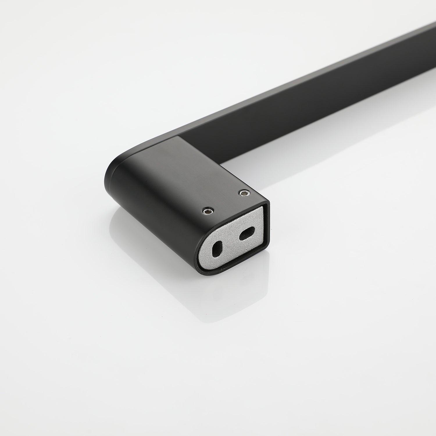 Black matte finish cabinet handle with a modern minimalist design