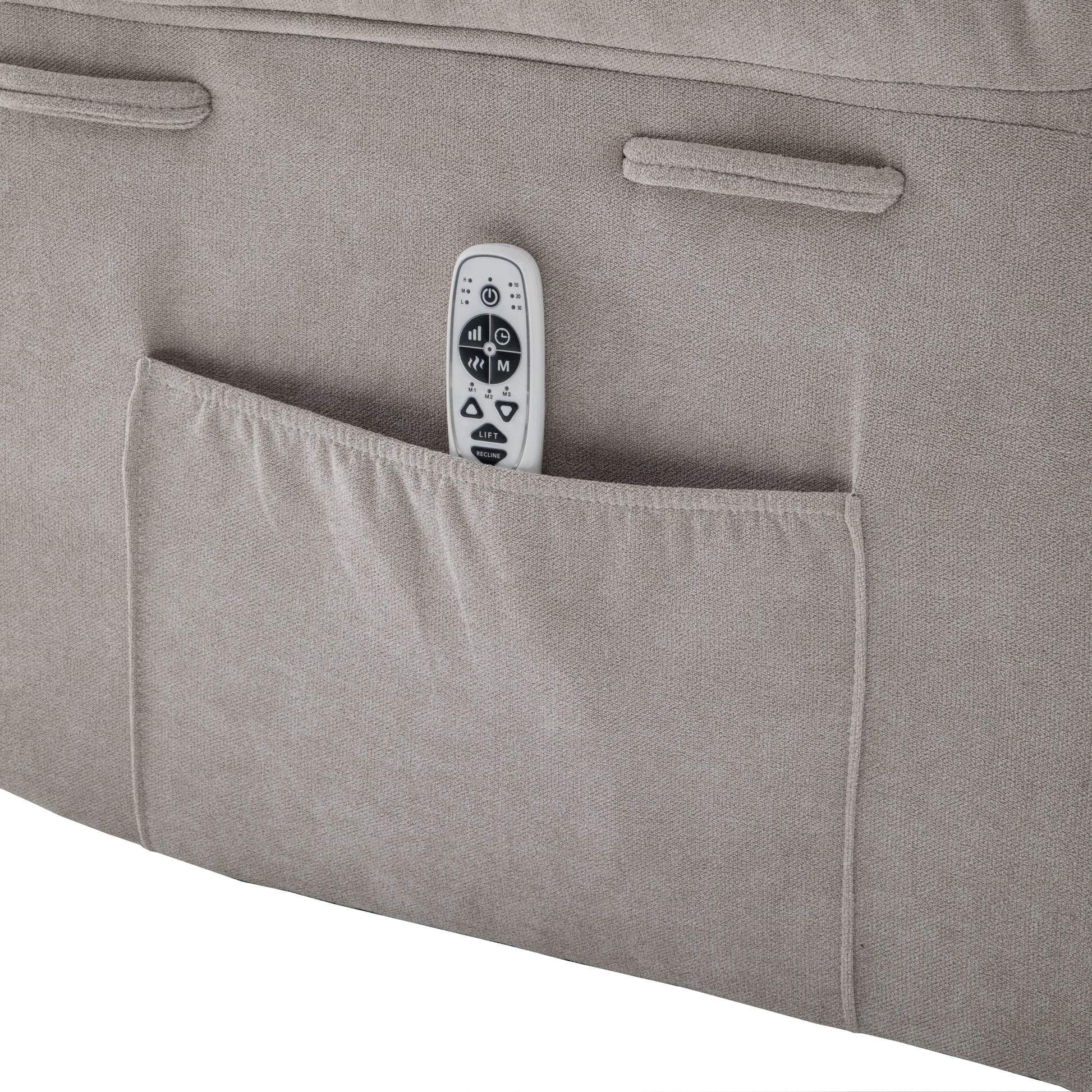 Closeup of a beige recliner fabric with a fitted pocket holding a white remote control for lift and recline functions
