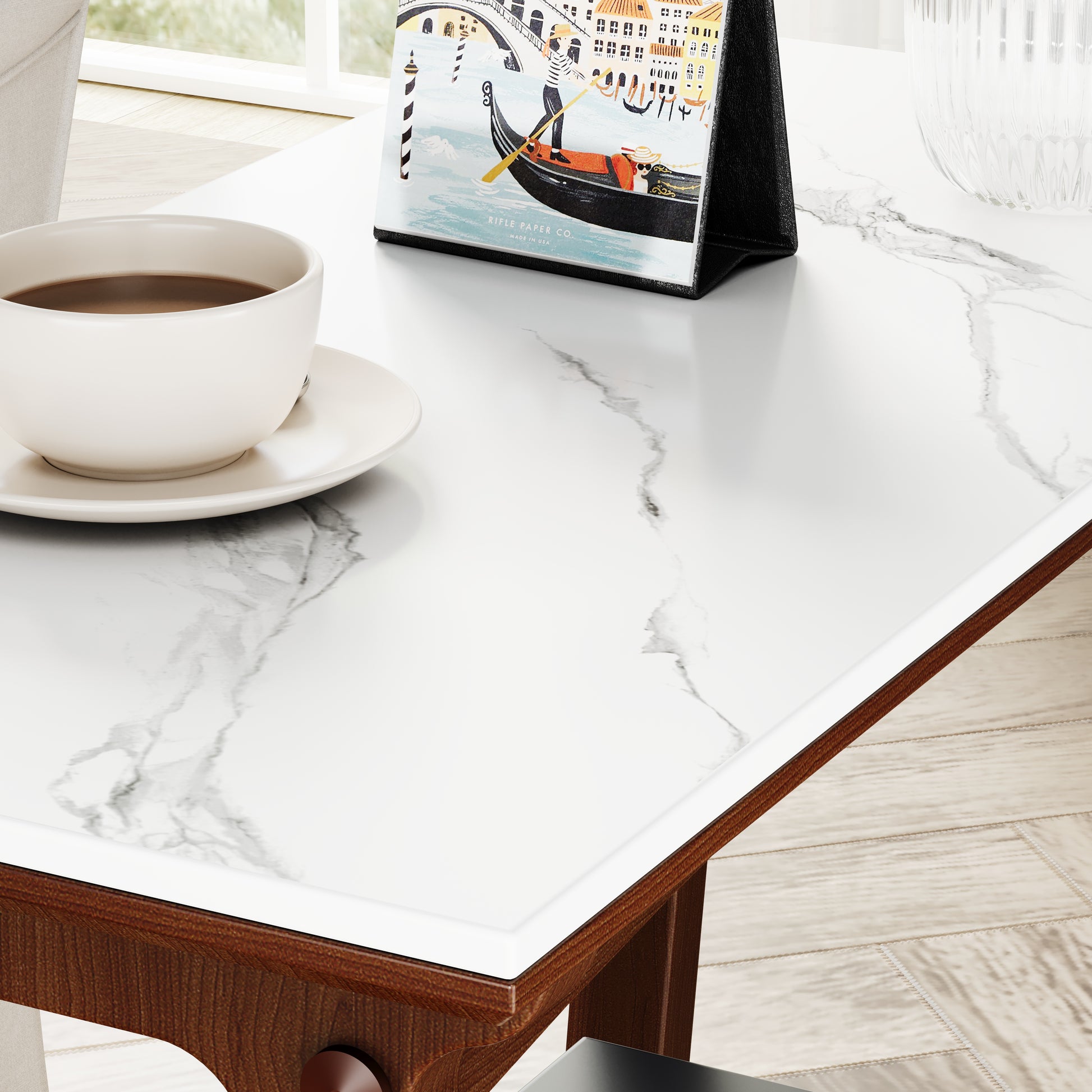 White marble coffee table with dark wood trim perfect for modern dining