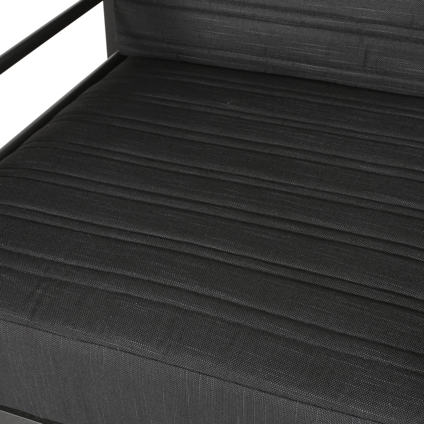 Black upholstered outdoor furniture seat with textured fabric and metal frame
