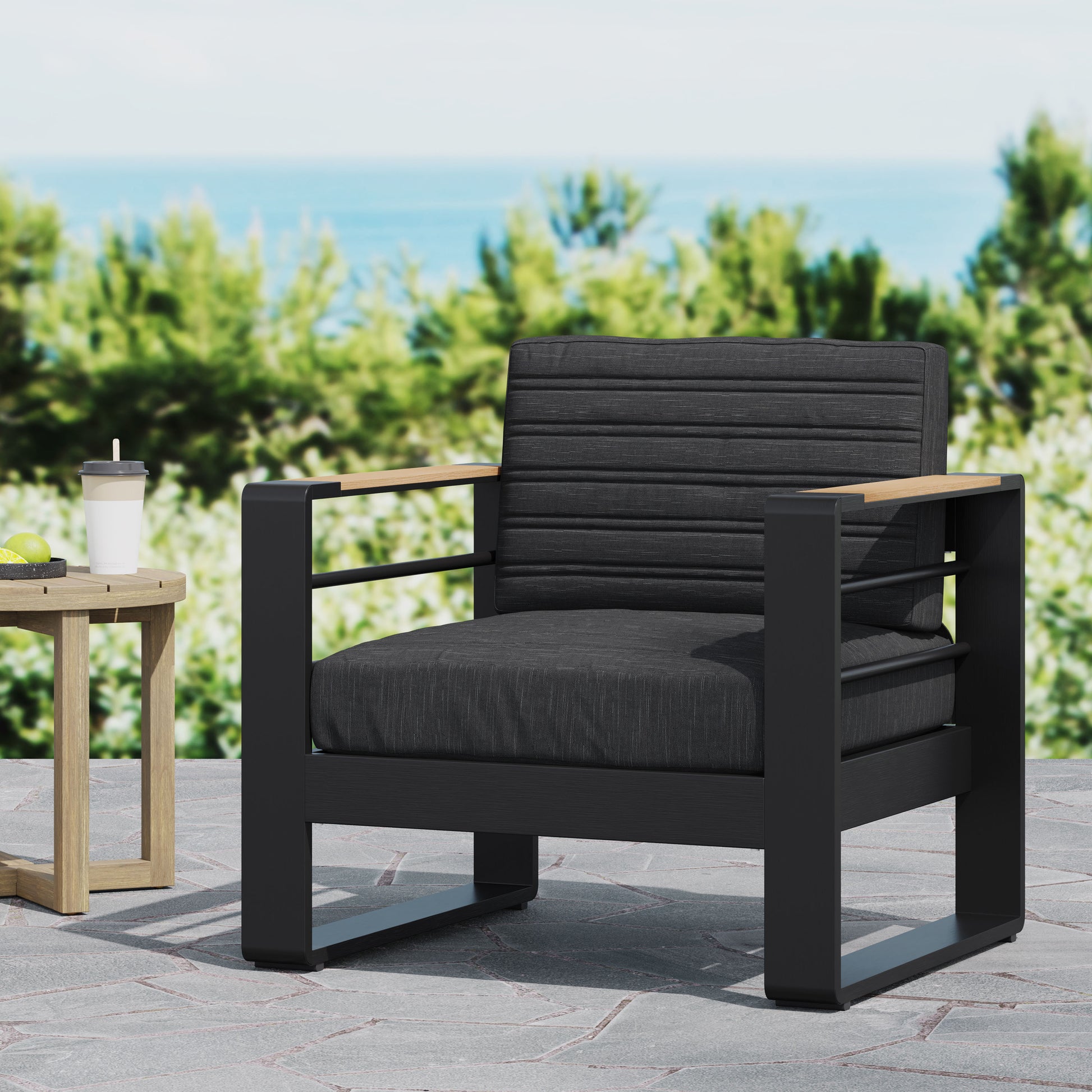 Modern charcoal outdoor armchair with sleek black frame and natural wood armrest accents