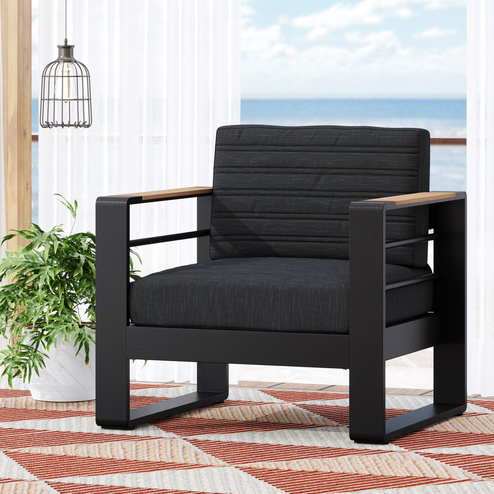 Modern outdoor lounge chair with charcoal fabric cushions and natural wood armrests
