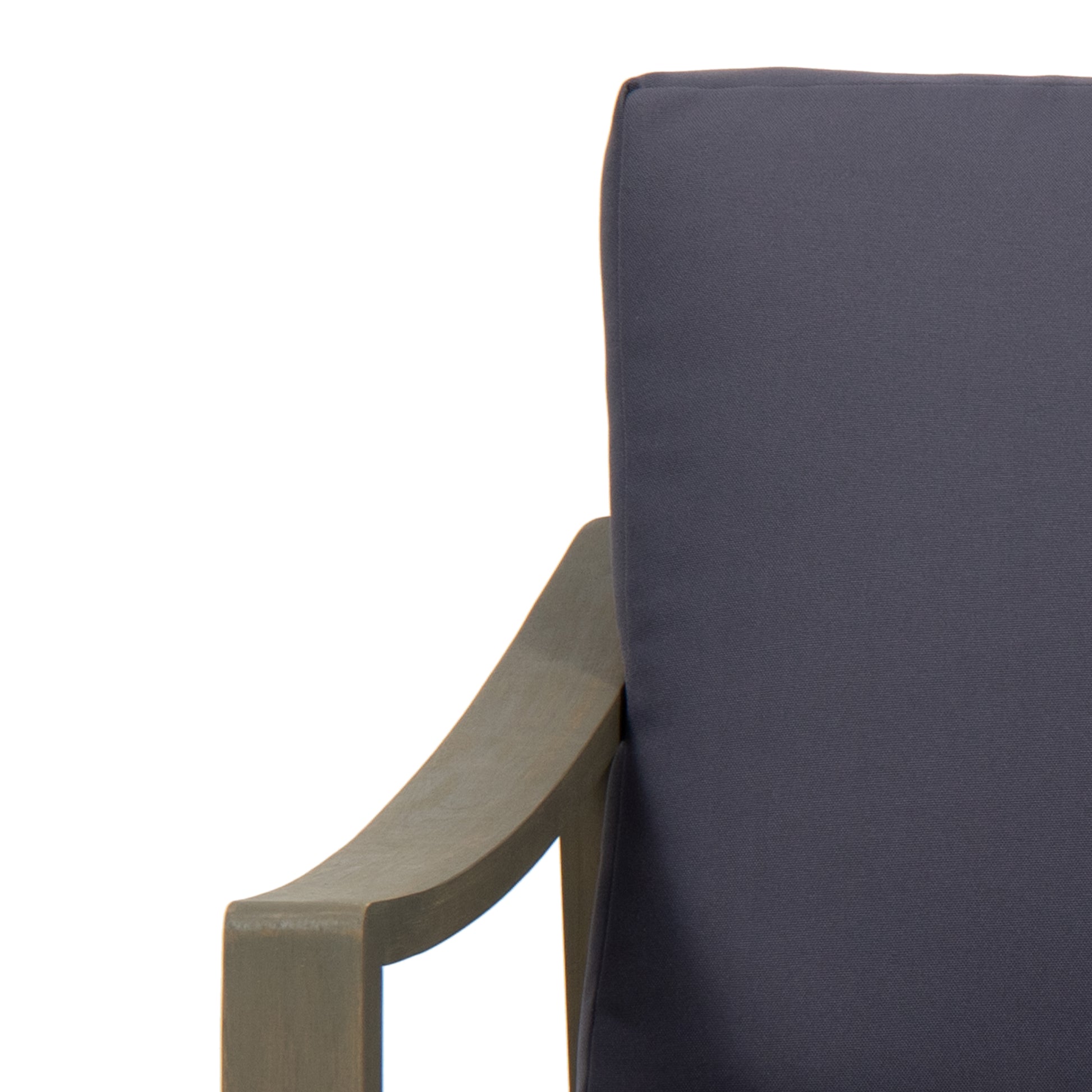 Dark grey outdoor chair cushion with curved wooden armrest detail