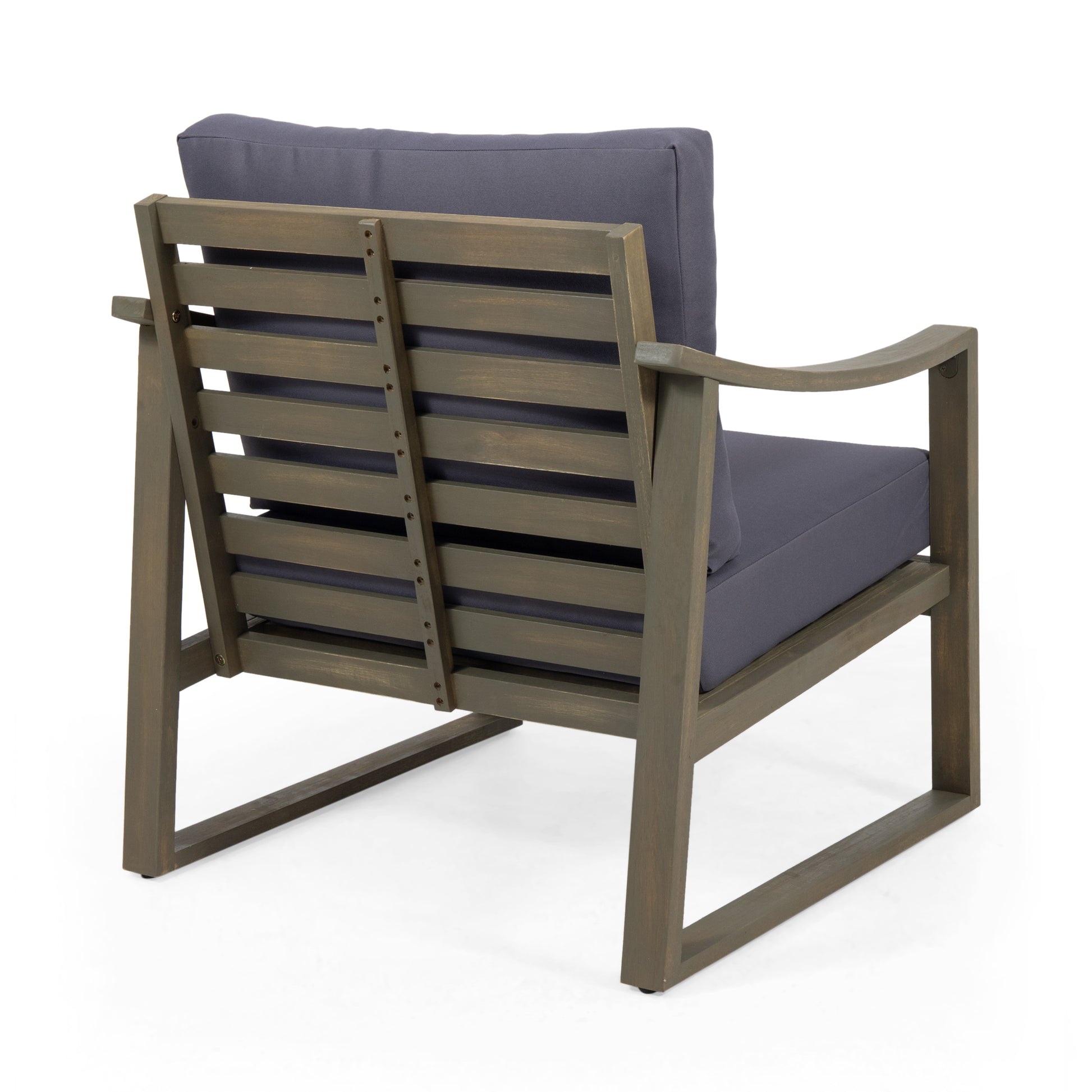 Modern slatted back wood armchair with navy cushions ideal for patio seating