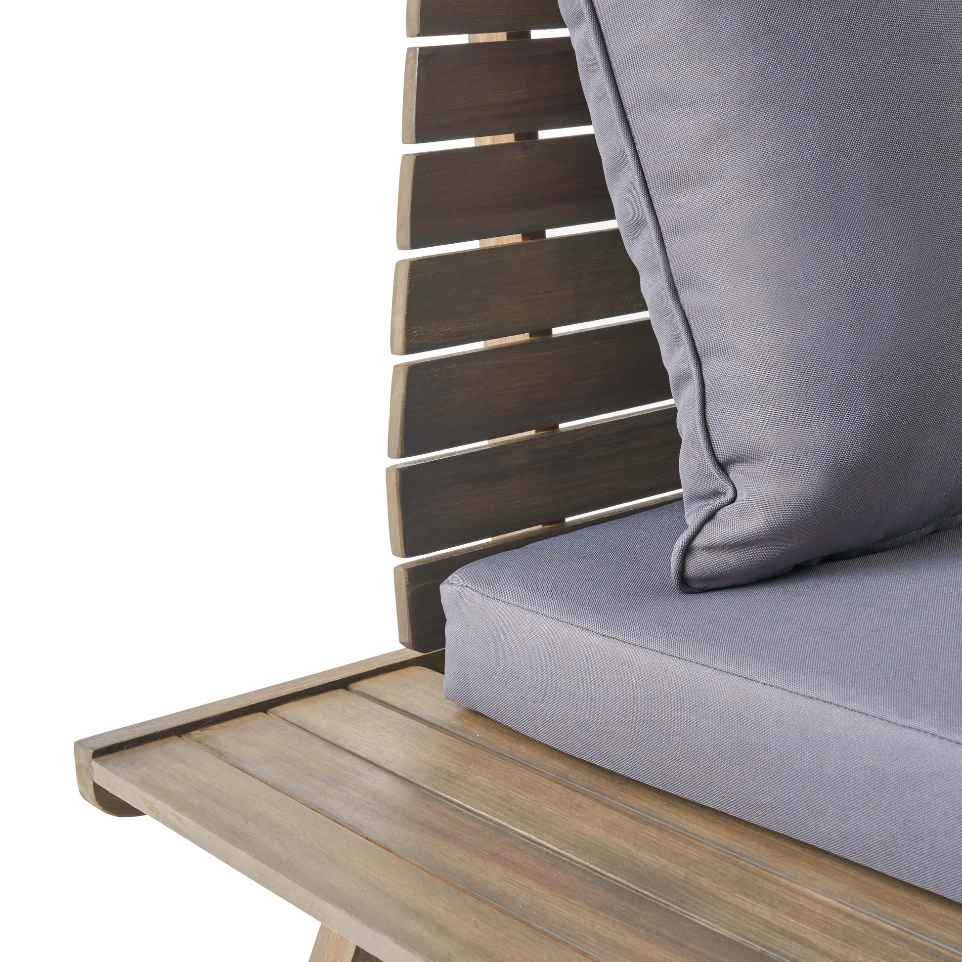 Dark brown slatted wood outdoor chair with plush grey seat cushion