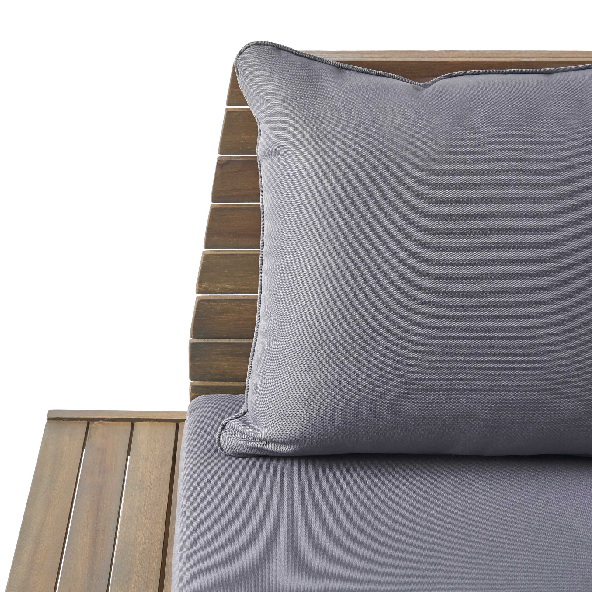 Closeup of grey outdoor chair cushion on a wooden slatted seat