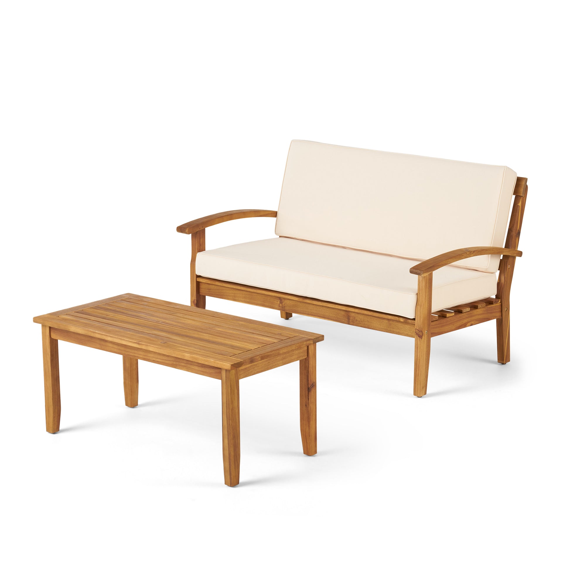 Wooden loveseat with cream cushions and matching coffee table for outdoor seating
