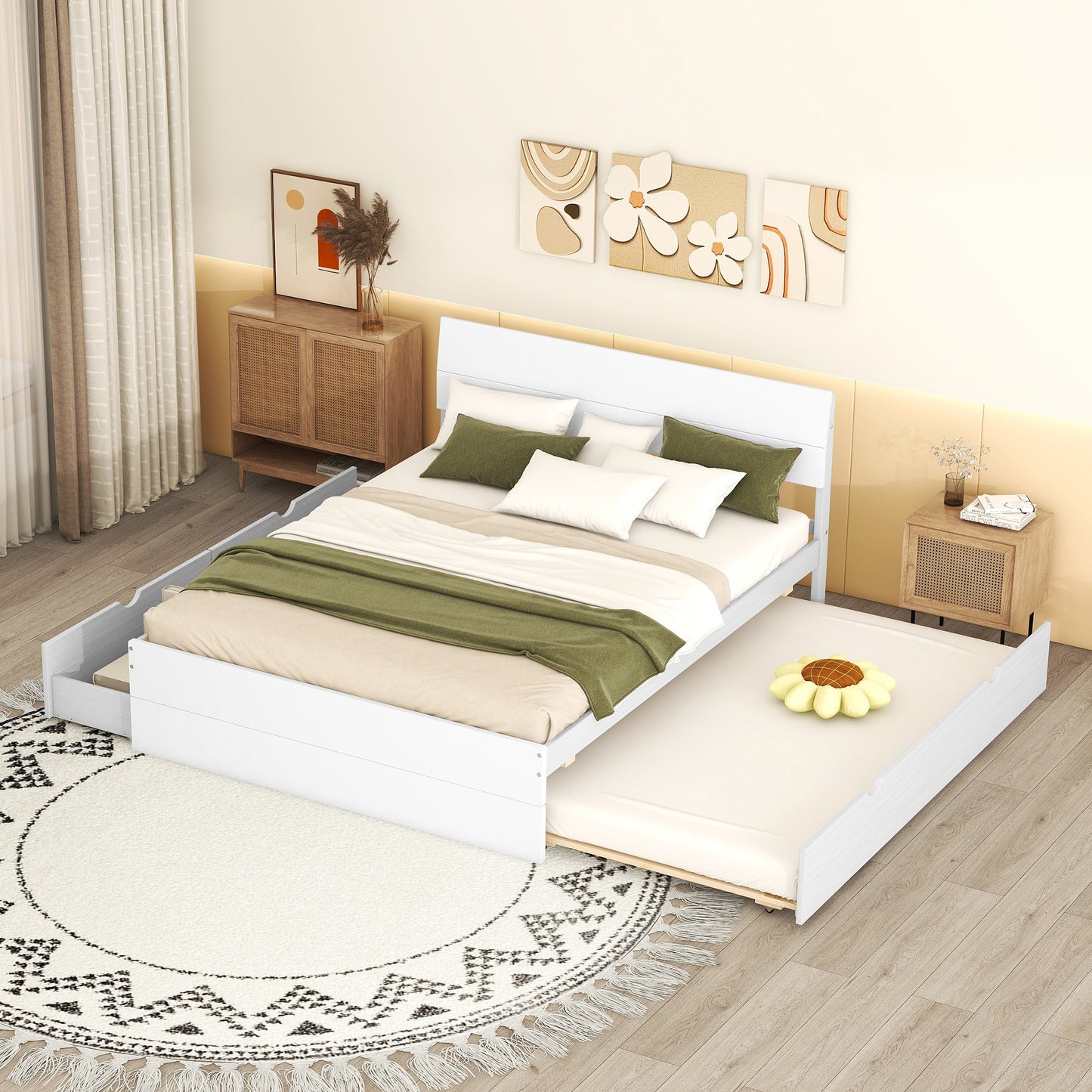 White twin bed with pullout trundle and green bedding