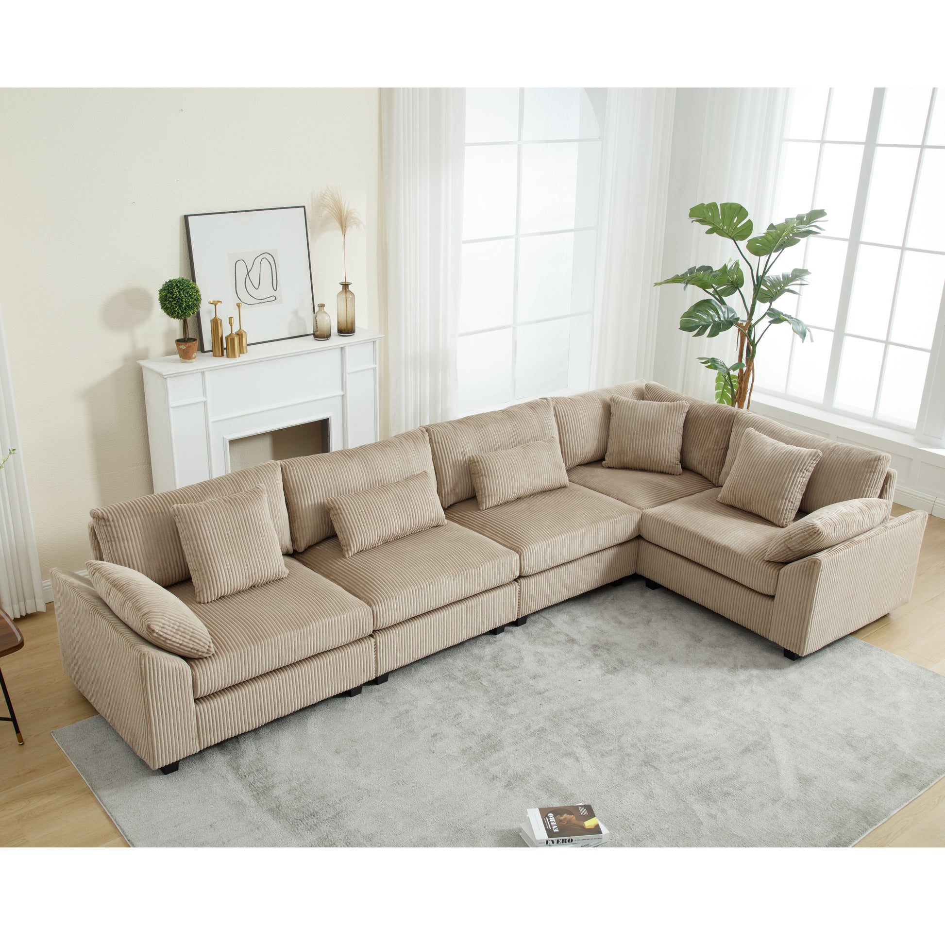 Comfortable tan corduroy sectional sofa with plush throw pillows for a modern living room