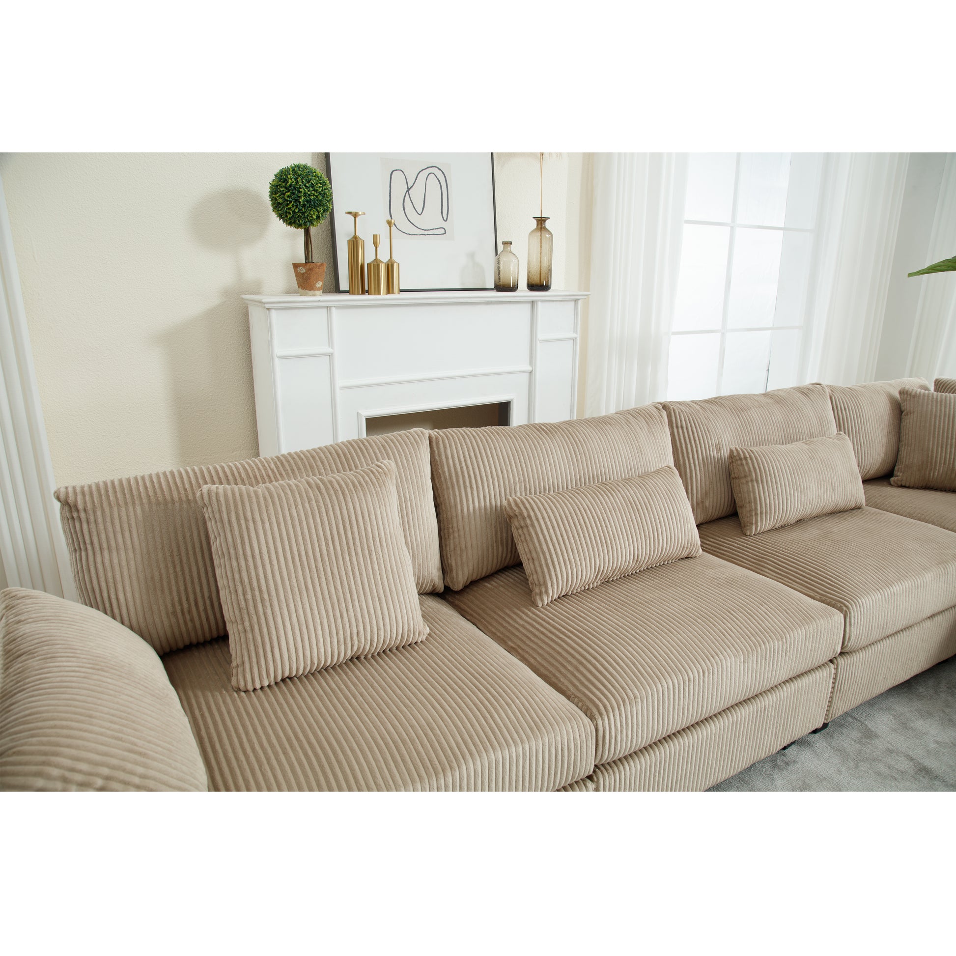 Beige corduroy sectional sofa with plush cushions for a cozy living room perfect for families