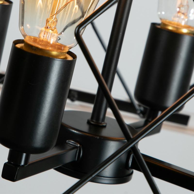 Close up of a black industrial chandelier with Edison bulbs