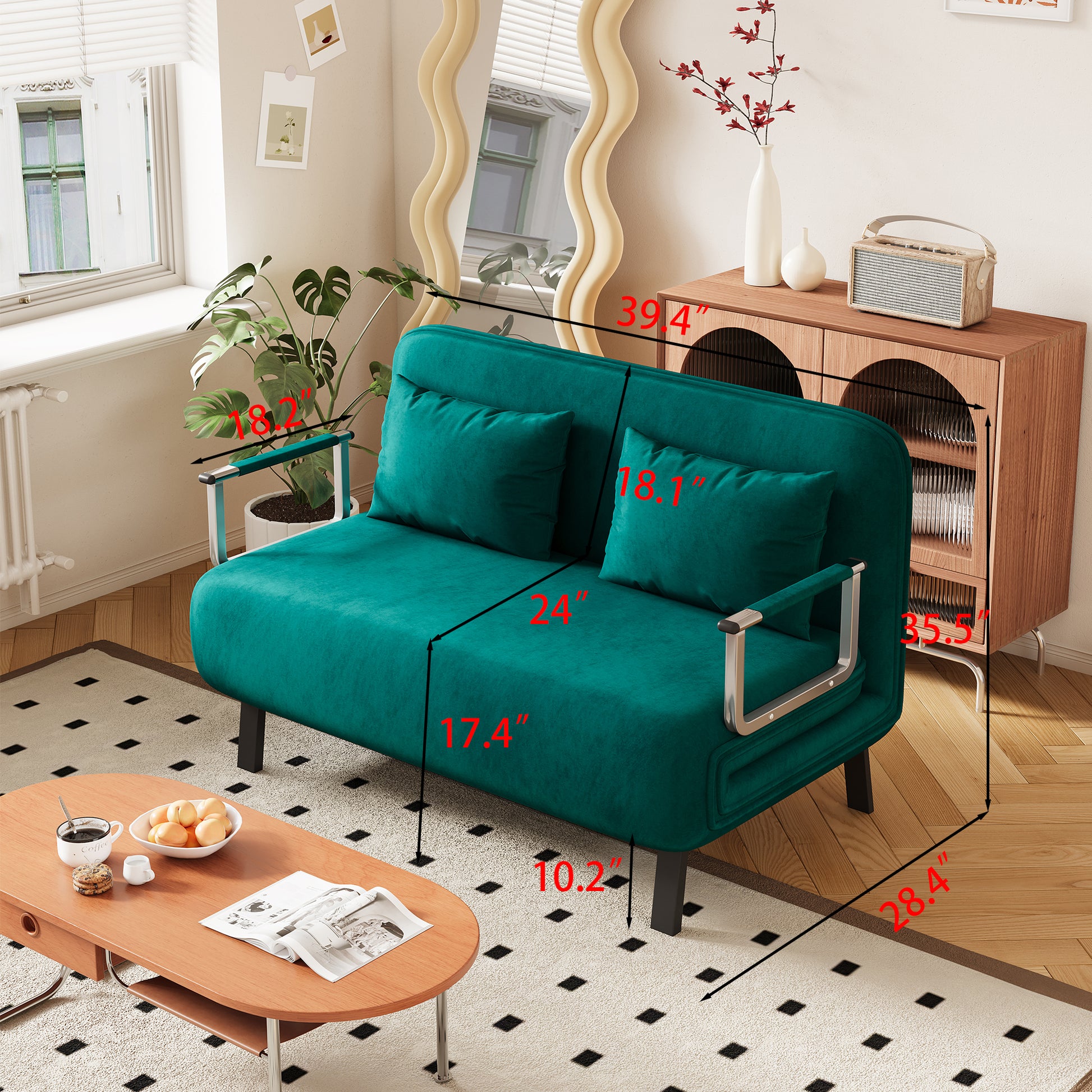 Teal velvet sofa bed with modern chrome accents and plush throw pillows