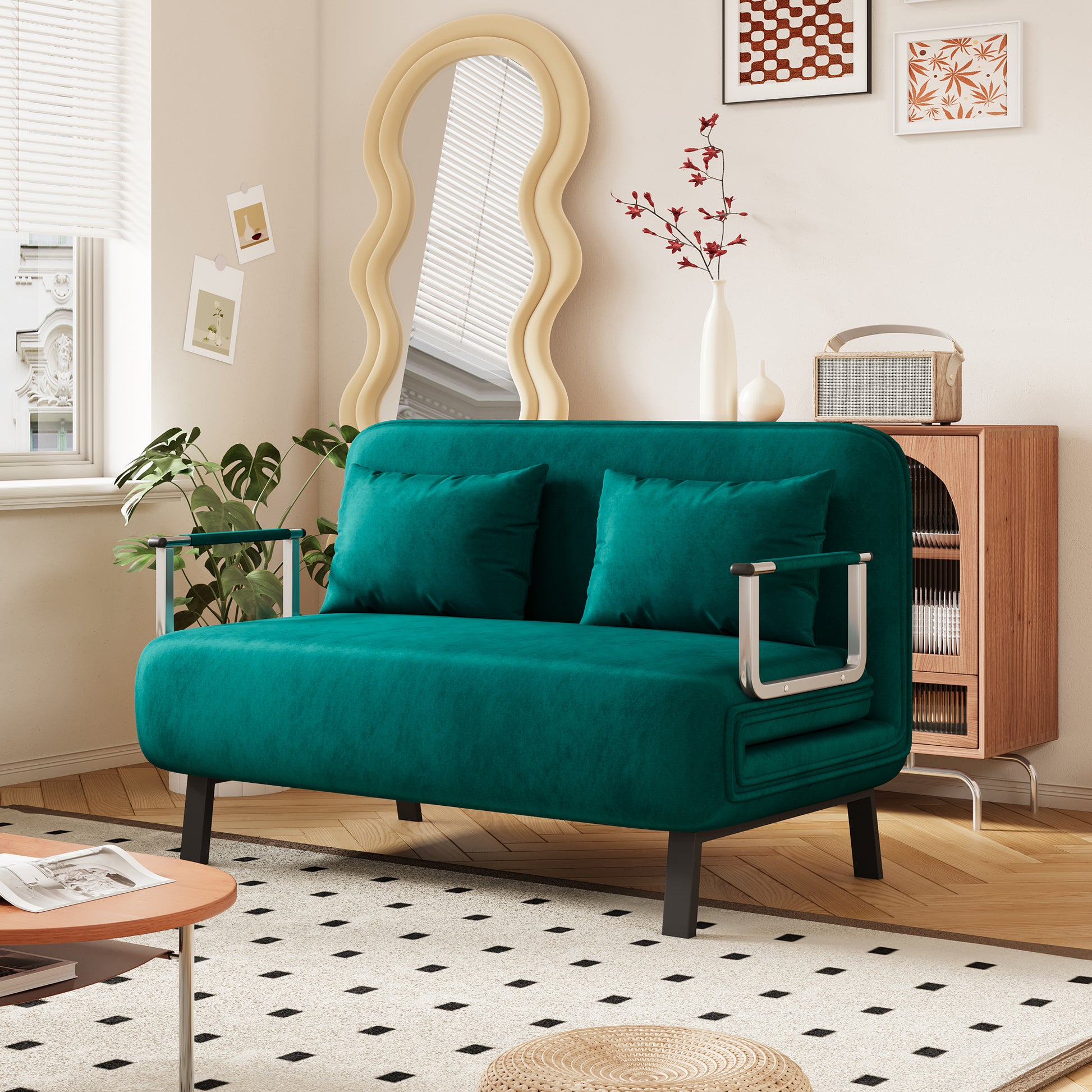 Teal velvet sofa with plush cushions and chrome armrests perfect for a modern living room