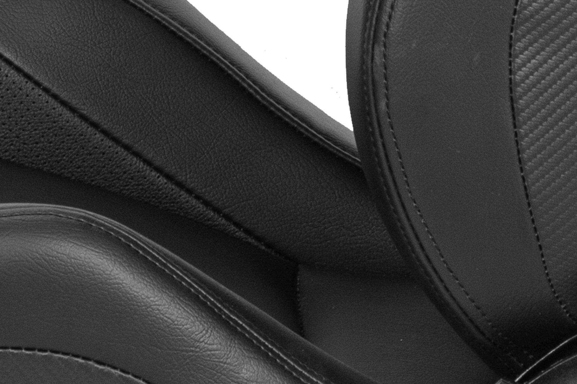 Black perforated leather seat detail with stitching