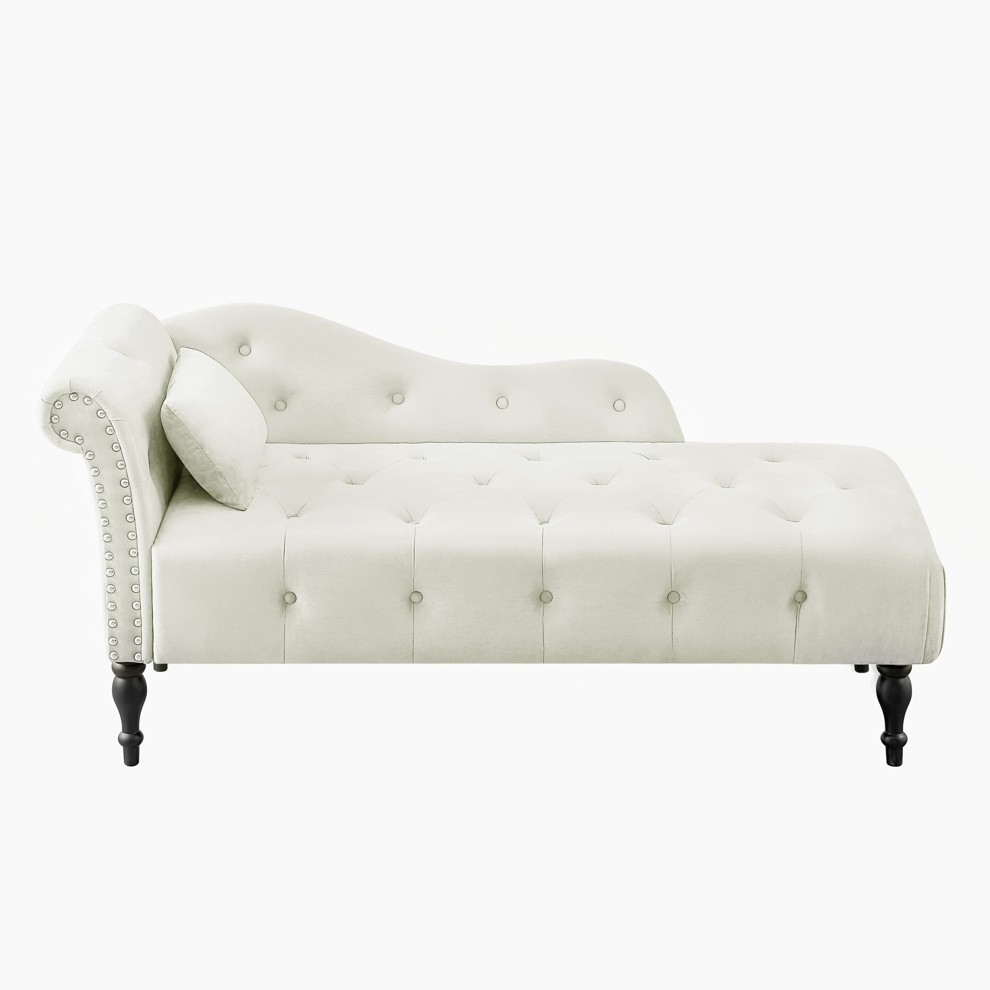 Elegant ivory velvet chaise lounge with tufted detailing and silver nailhead trim