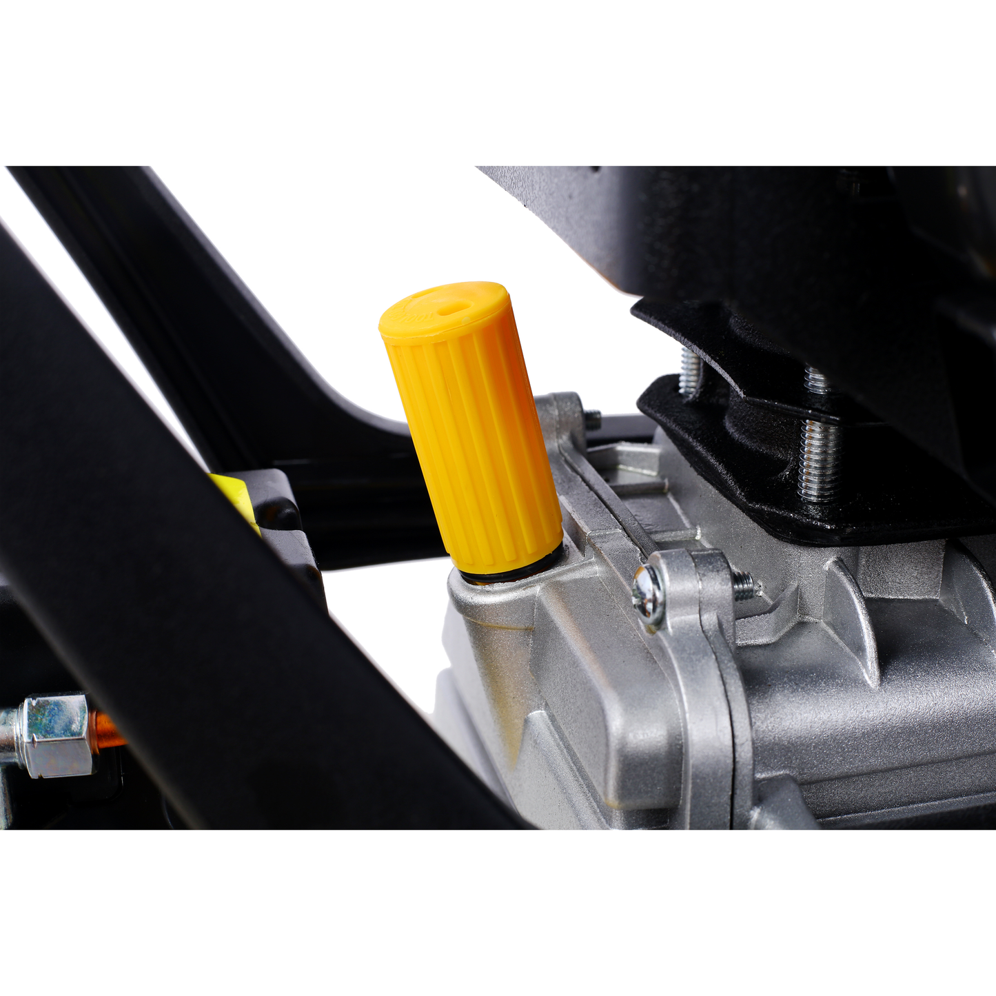 Yellow plastic cap on a silver pressure washer pump showing ribbed texture and hexagonal base