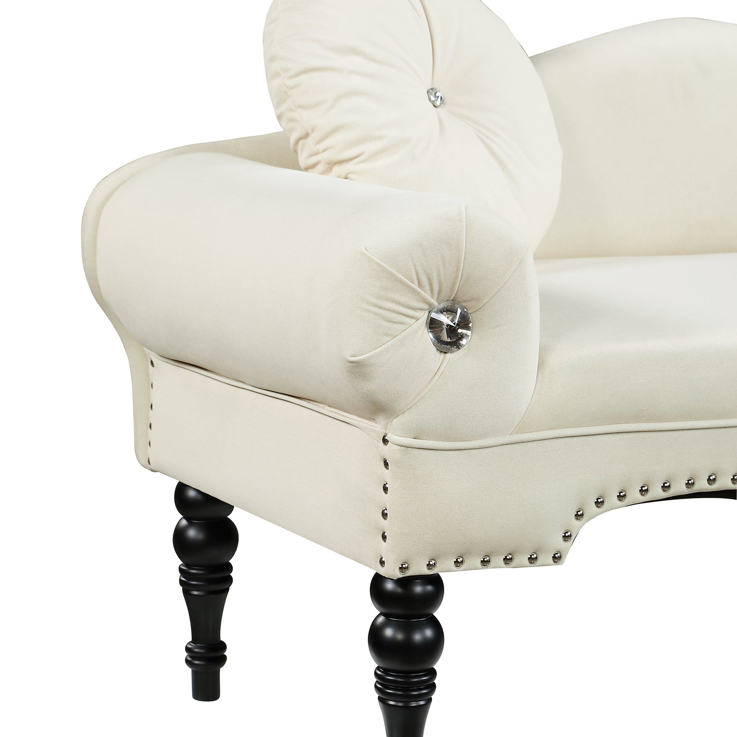 Cream velvet armchair with diamond tufting and black turned legs