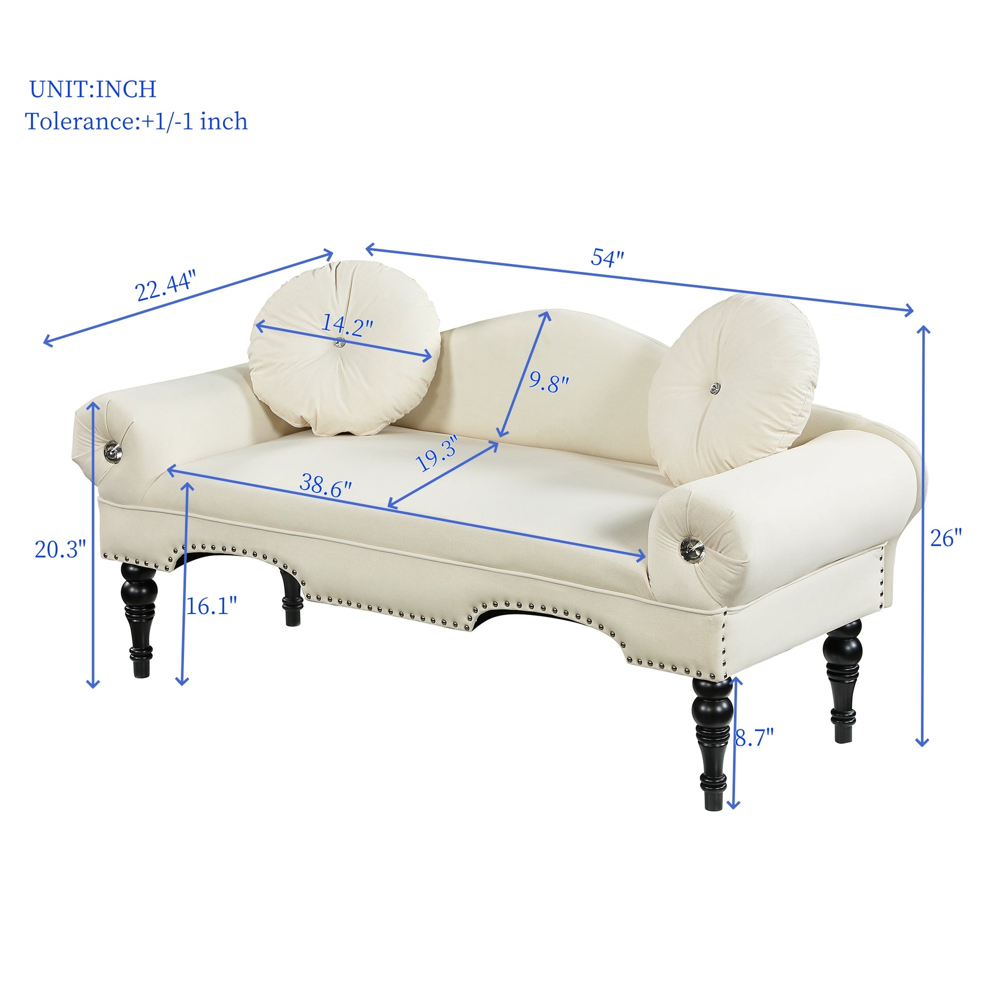 Cream tufted chaise lounge with decorative nailhead trim and round bolster pillows