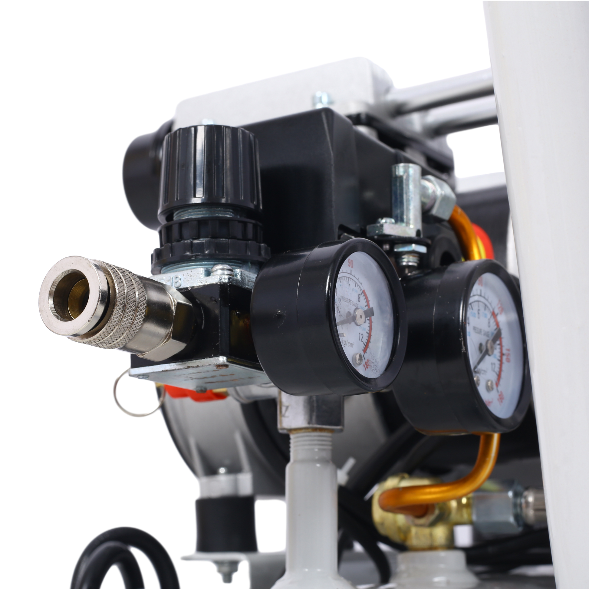 Closeup of air compressor regulator with pressure gauge
