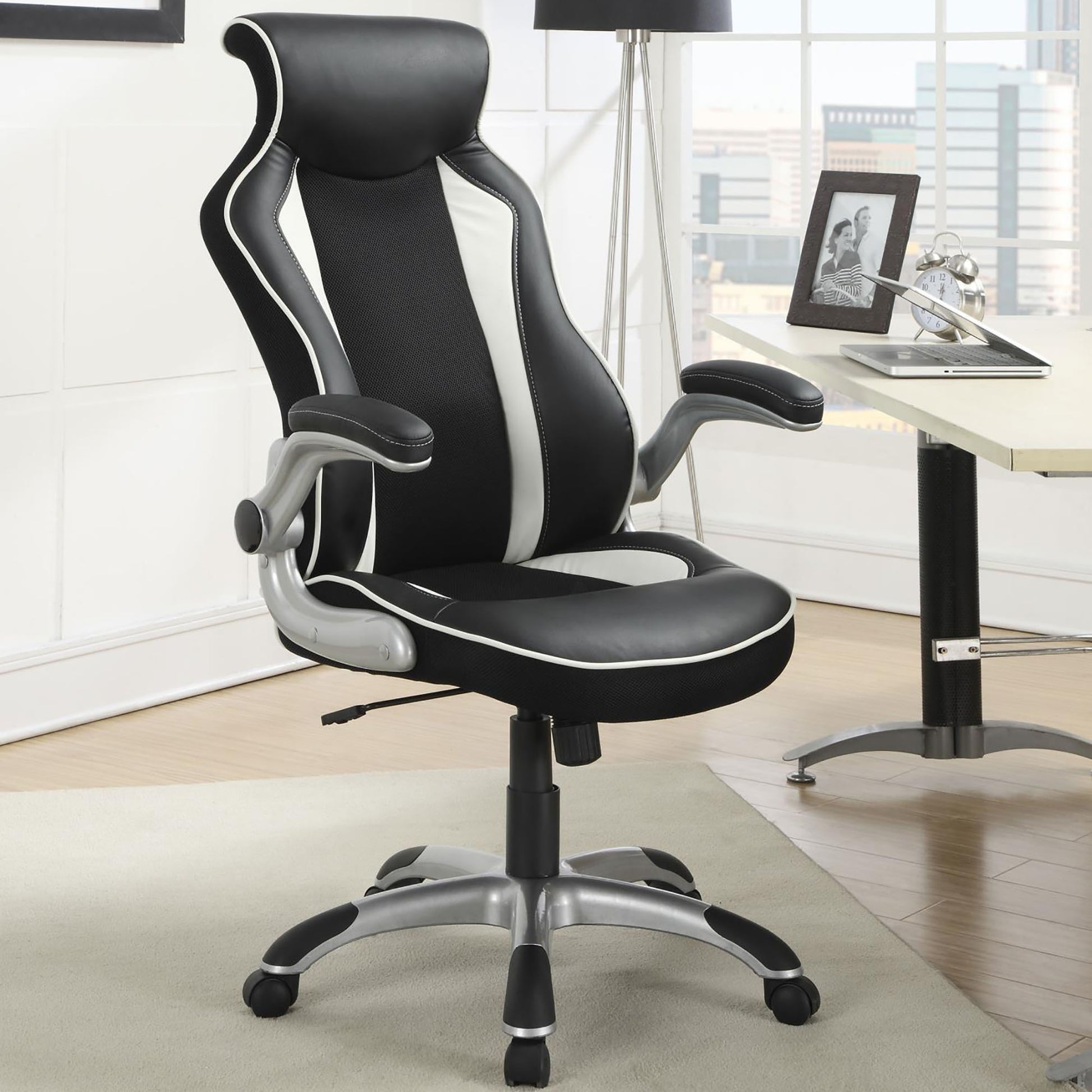 Black and white racing gaming chair with ergonomic mesh back for ultimate comfort