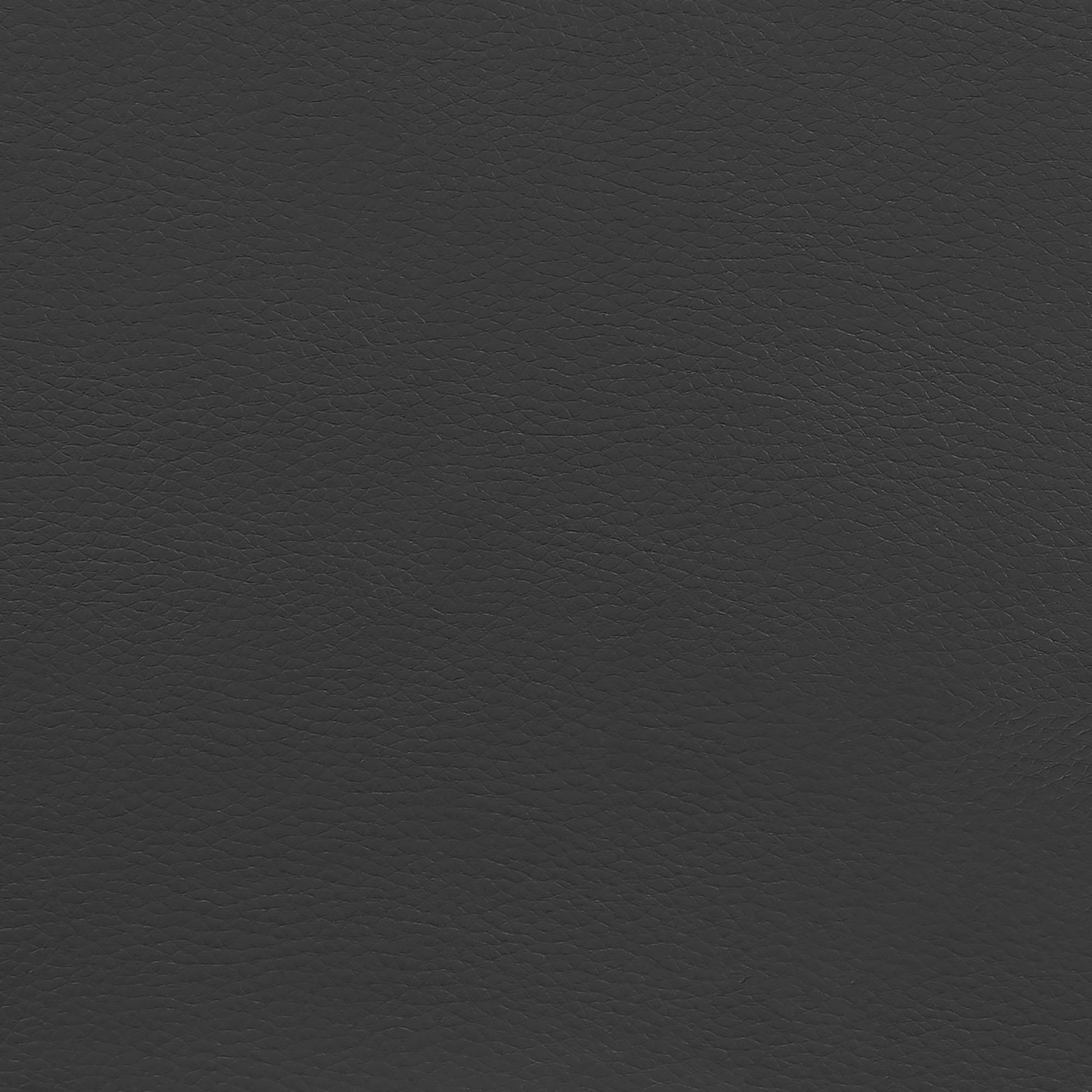 Closeup texture of dark gray genuine leather upholstery for furniture or accessories