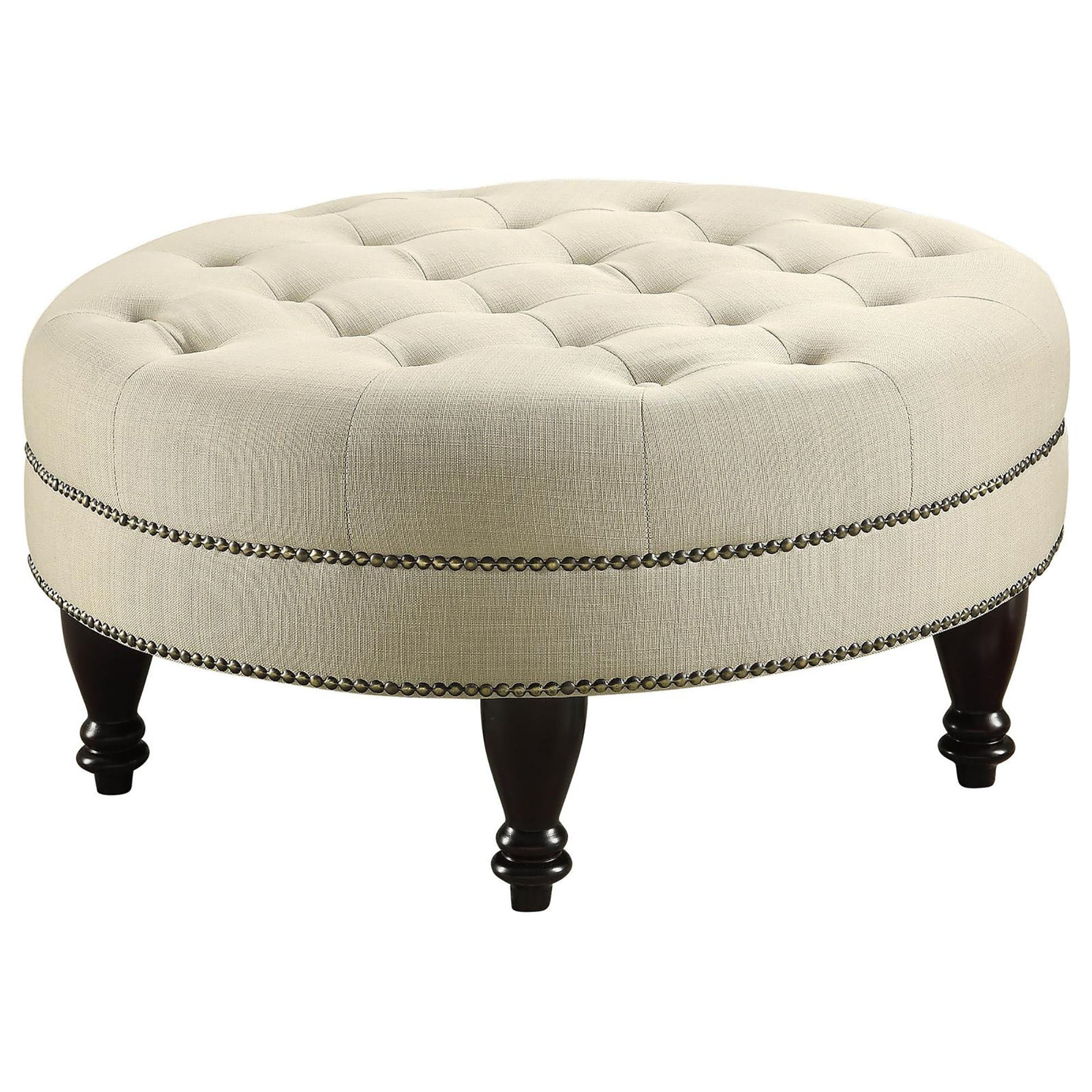 Tufted linen round ottoman in cream with nailhead trim and dark wood legs