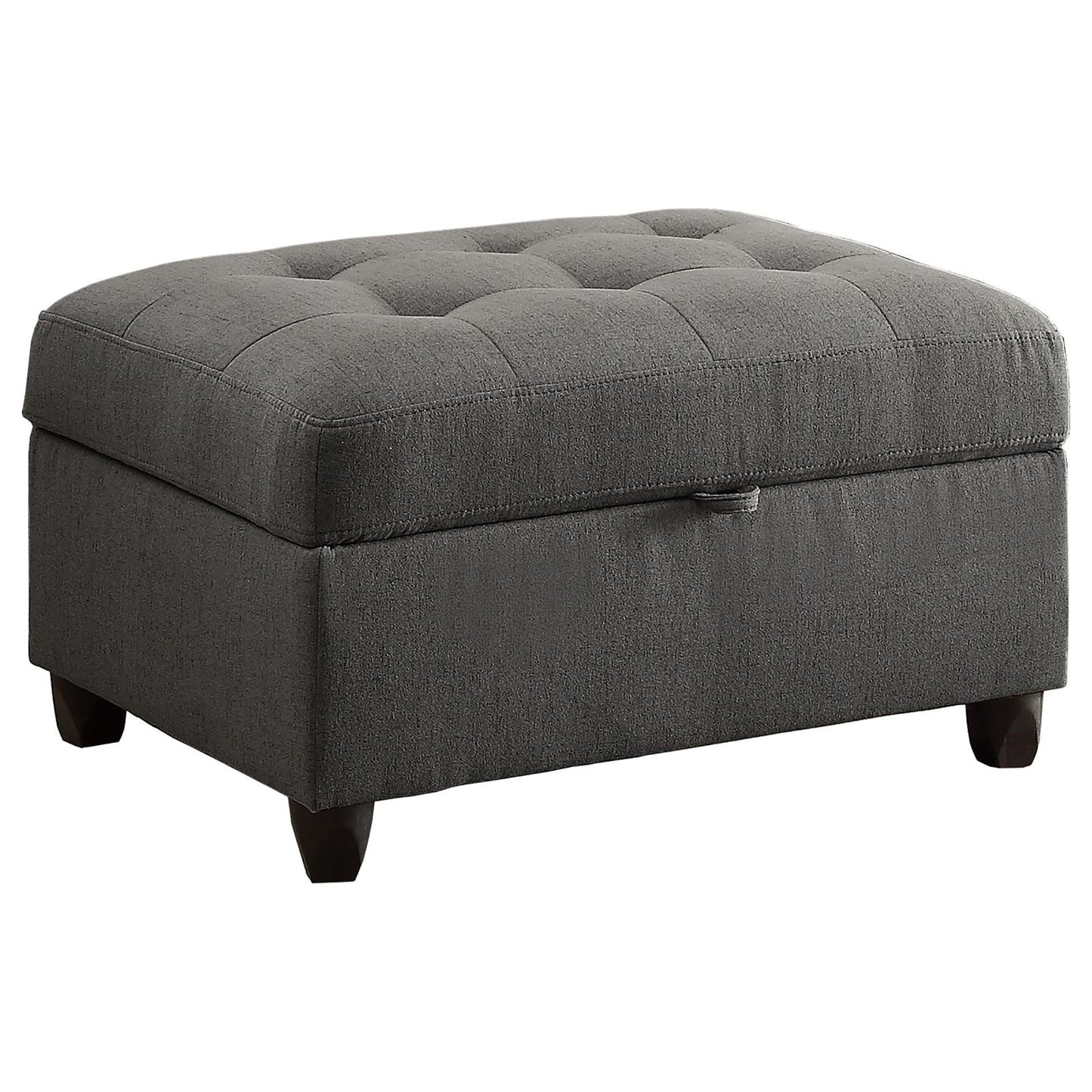 Dark grey tufted storage ottoman with subtle linen texture and dark wood legs