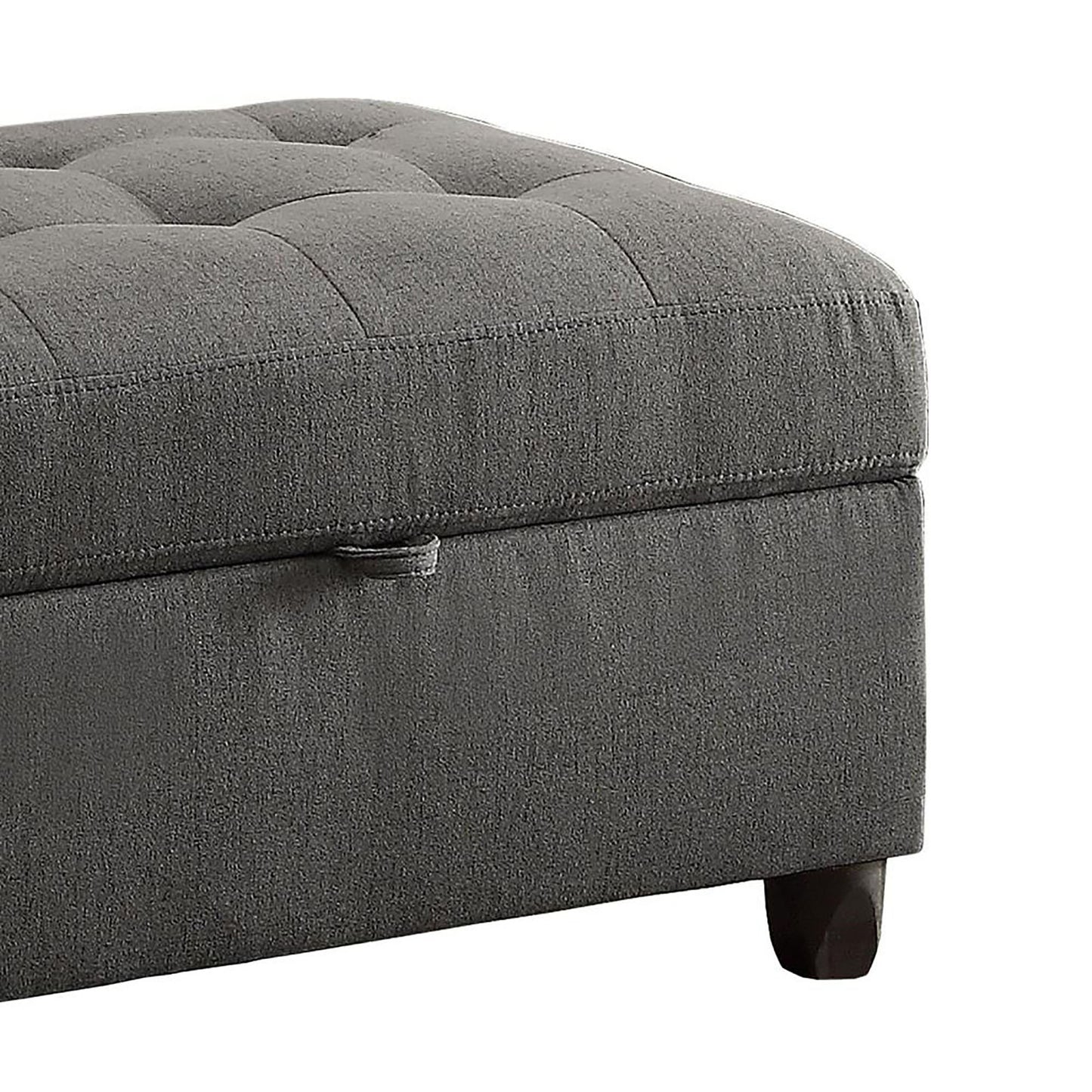 Tufted charcoal grey fabric storage ottoman with wooden feet for living room
