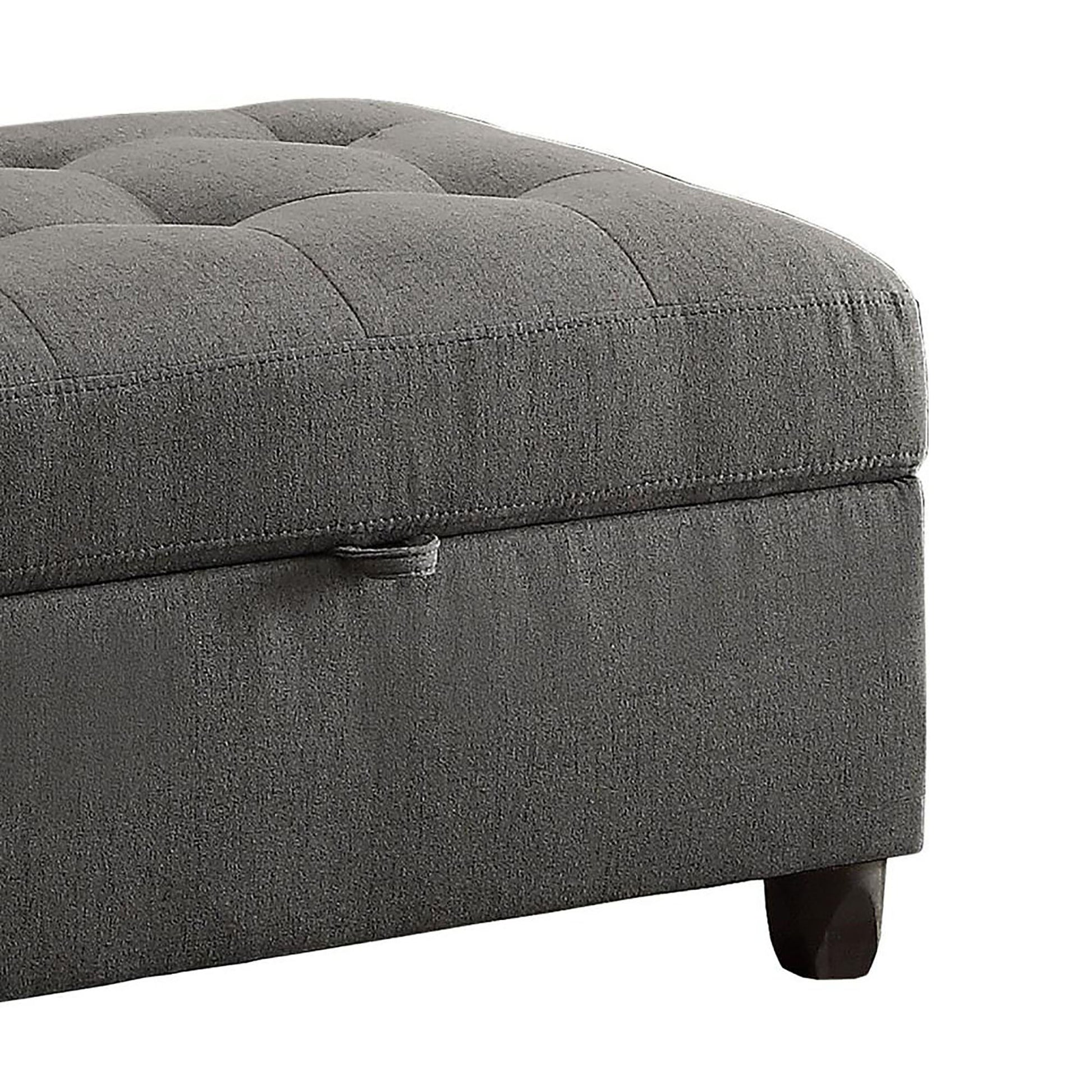 Tufted charcoal grey fabric storage ottoman with wooden feet for living room