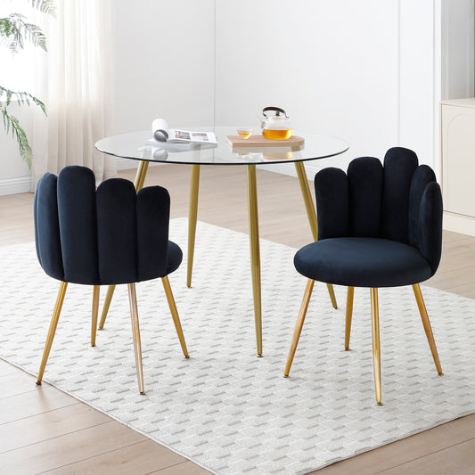 Dark navy velvet accent chair with petaled back and gold legs