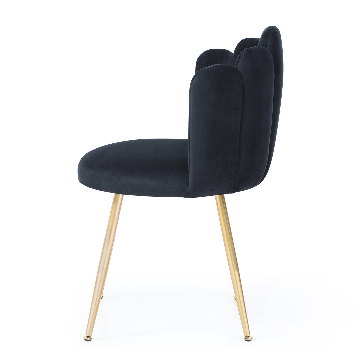 Dark blue velvet chair with sculpted back and gold tapered legs