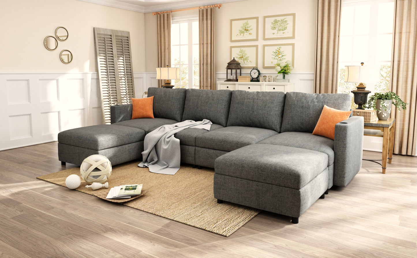 Deep grey sectional sofa with chaise and orange accent pillows perfect for modern living rooms